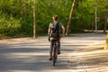 Man biking in the Amsterdam Vondelpark. Royalty Free Stock Photo