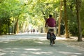 Man biking in the Vondelpark in Amsterdam