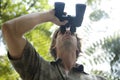 Man with Binoculars Royalty Free Stock Photo