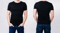 Man in black blank tshirt on gray background