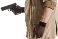 Man in black gloves with a gun Royalty Free Stock Photo