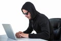 Man in black hoodie using laptop Royalty Free Stock Photo
