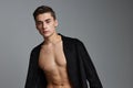 man in black jacket naked torso attractive look posing self-confidence