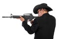 Man in black shooting with rifle Royalty Free Stock Photo