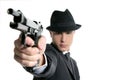 Man with black suit and gun Royalty Free Stock Photo