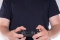 Man in black t-shirt playing video games