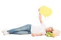 man with blank banner in hand lying on paper bag with food Royalty Free Stock Photo