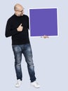 Man with a blank blue square board