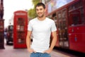 Man in blank white t-shirt over london city street Royalty Free Stock Photo