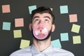 Man blowing bubble with gum Royalty Free Stock Photo