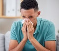 Man blowing nose, sick with virus and health with hayfever, medicine with cold or flu while at home. Young male person