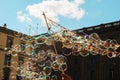 Man blows bubbles in Italy