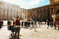 Man blows bubbles in Italy