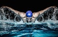 Man in blue cap in swimming pool Royalty Free Stock Photo