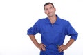 Man in blue overalls Royalty Free Stock Photo