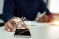 Man in blue shirt hand using on digital mobile phone with virtual digital icon Royalty Free Stock Photo