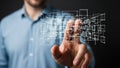 Man in Blue Shirt Interacting with a3D Wireframe Digital Network Structure with His Finger Royalty Free Stock Photo