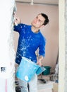 Man puttying doorway in apartment Royalty Free Stock Photo