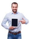 Man in blue shirt shows touch screen Royalty Free Stock Photo