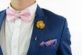 Man in blue suit bowtie, pocket square Royalty Free Stock Photo