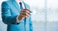 Man in blue suit interacting with digital checklist and document interface digital interface Royalty Free Stock Photo
