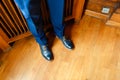 The man in the blue suit legs closeup shoes. Royalty Free Stock Photo