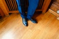 The man in the blue suit legs closeup shoes. Royalty Free Stock Photo