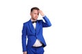 Man in blue suite with incredulous face on white background Royalty Free Stock Photo