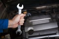 Man in blue technician uniform going to repair for car maintenance