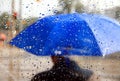 Man With Blue Umbrella Royalty Free Stock Photo