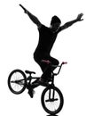 Man bmx acrobatic figure silhouette Royalty Free Stock Photo