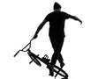 Man bmx acrobatic figure silhouette Royalty Free Stock Photo