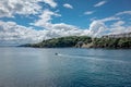 A man in a boat on beautiful summer day in Fowey, Cornwall