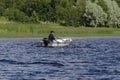 Man on a boat fishing