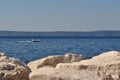 Man in boat on the adriatic sea. Podgora, Croatia Royalty Free Stock Photo
