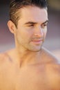 Man, body and beach athlete in water swimming, surfing and sports in Brazilian nature and relax summer break. Serious Royalty Free Stock Photo