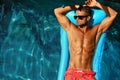 Man Body In Summer. Male Relaxing In Pool On Vacation