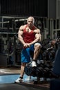 Man bodybuilder in GYM Royalty Free Stock Photo