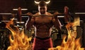 Man bodybuilder like a devil in fire