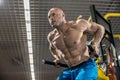 Man bodybuilder perform exercise