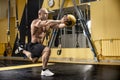 Man bodybuilder perform exercise