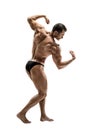 Man - bodybuilder pose on white background Royalty Free Stock Photo
