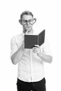 Man with book. Study hard. Self improvement literature. University student with lecture notes. Teacher funny guy. Male Royalty Free Stock Photo