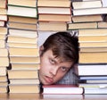 Man between books Royalty Free Stock Photo