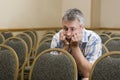 Man at a boring conference Royalty Free Stock Photo