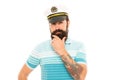 Man born to sail. Bearded man isolated on white. Sailor man in striped blue. Naval man in peaked cap touch beard Royalty Free Stock Photo