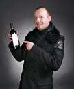 Man with bottle of wine Royalty Free Stock Photo