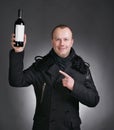 Man with bottle of wine Royalty Free Stock Photo