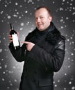 Man with bottle of wine Royalty Free Stock Photo