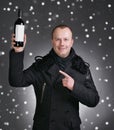 Man with bottle of wine Royalty Free Stock Photo